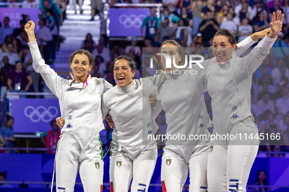  Team Italy celebrate victory during the Fencing Women's Epee Team Gold Medal match between Team France and Team Ital on day four of the Oly...