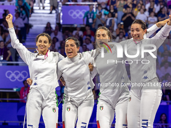  Team Italy celebrate victory during the Fencing Women's Epee Team Gold Medal match between Team France and Team Ital on day four of the Oly...