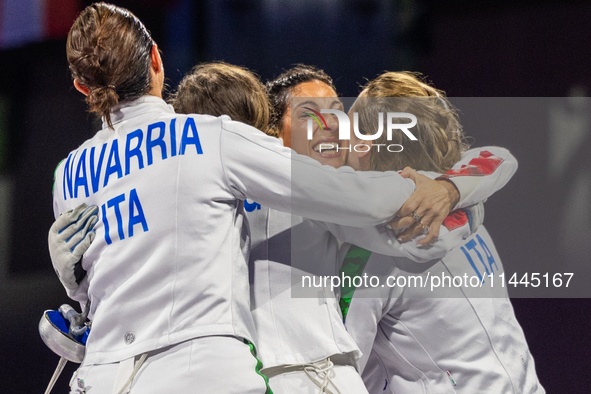  Team Italy celebrate victory during the Fencing Women's Epee Team Gold Medal match between Team France and Team Ital on day four of the Oly...