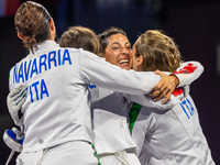  Team Italy celebrate victory during the Fencing Women's Epee Team Gold Medal match between Team France and Team Ital on day four of the Oly...