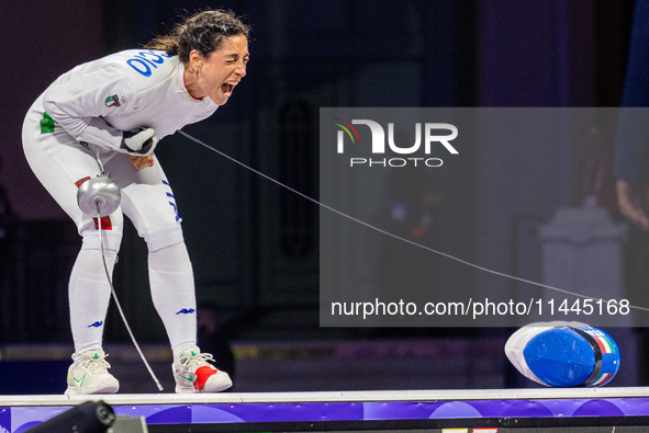 Alberta Santuccio of Team Italy celebrates winning the Fencing Women's Epee Team Gold Medal match between Team France and Team Ital on day f...