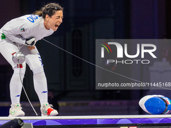 Alberta Santuccio of Team Italy celebrates winning the Fencing Women's Epee Team Gold Medal match between Team France and Team Ital on day f...