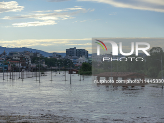 Flooding is submerging a section of road in Kathmandu, Nepal, on July 31, 2024. (