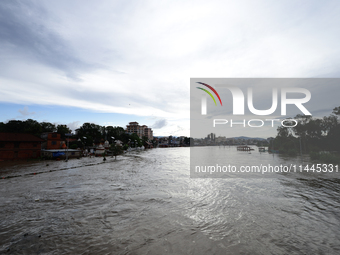 Flooding is submerging a section of road in Kathmandu, Nepal, on July 31, 2024. (