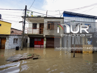 Houses are being partially submerged after heavy rainfall in Kathmandu, Nepal, on July 31, 2024. (