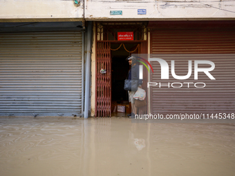 Houses are being partially submerged after heavy rainfall in Kathmandu, Nepal, on July 31, 2024. (