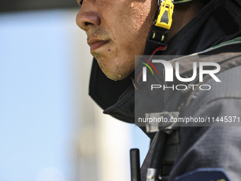 Firefighters are performing a rescue drill at a chemical plant amid high temperatures in Huai'an, China, on July 31, 2024. (