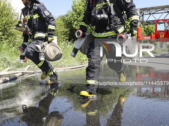 Firefighters are performing a rescue drill at a chemical plant amid high temperatures in Huai'an, China, on July 31, 2024. (