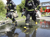 Firefighters are performing a rescue drill at a chemical plant amid high temperatures in Huai'an, China, on July 31, 2024. (