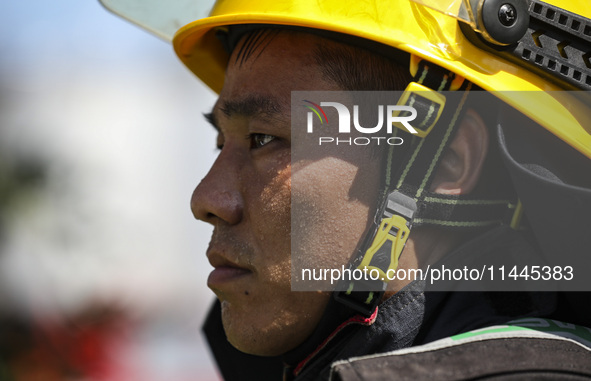 Firefighters are performing a rescue drill at a chemical plant amid high temperatures in Huai'an, China, on July 31, 2024. 