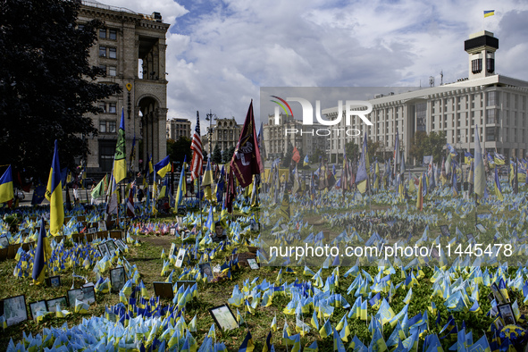 A makeshift memorial is honoring the Ukrainian Armed Forces soldiers who are dying in battles with Russian troops on Independence Square in...