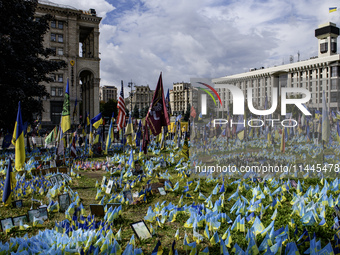 A makeshift memorial is honoring the Ukrainian Armed Forces soldiers who are dying in battles with Russian troops on Independence Square in...