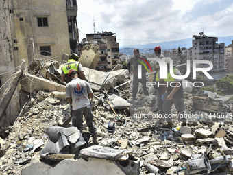 A view is showing a partially destroyed building, which is being targeted by the Israeli army, in Beirut, Lebanon, on July 31, 2024. The Isr...