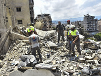 A view is showing a partially destroyed building, which is being targeted by the Israeli army, in Beirut, Lebanon, on July 31, 2024. The Isr...