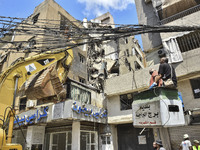 A view is showing a partially destroyed building, which is being targeted by the Israeli army, in Beirut, Lebanon, on July 31, 2024. The Isr...