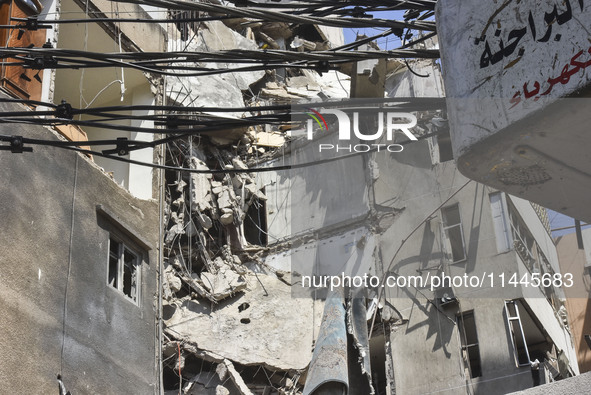 A view is showing a partially destroyed building, which is being targeted by the Israeli army, in Beirut, Lebanon, on July 31, 2024. The Isr...