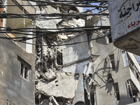 A view is showing a partially destroyed building, which is being targeted by the Israeli army, in Beirut, Lebanon, on July 31, 2024. The Isr...