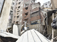 A view is showing a partially destroyed building, which is being targeted by the Israeli army, in Beirut, Lebanon, on July 31, 2024. The Isr...