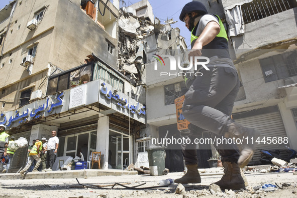 A view is showing a partially destroyed building, which is being targeted by the Israeli army, in Beirut, Lebanon, on July 31, 2024. The Isr...