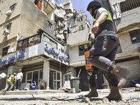 A view is showing a partially destroyed building, which is being targeted by the Israeli army, in Beirut, Lebanon, on July 31, 2024. The Isr...