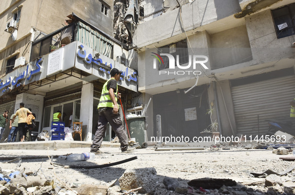 A view is showing a partially destroyed building, which is being targeted by the Israeli army, in Beirut, Lebanon, on July 31, 2024. The Isr...