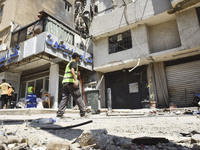 A view is showing a partially destroyed building, which is being targeted by the Israeli army, in Beirut, Lebanon, on July 31, 2024. The Isr...