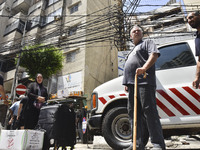 A view is showing a partially destroyed building, which is being targeted by the Israeli army, in Beirut, Lebanon, on July 31, 2024. The Isr...