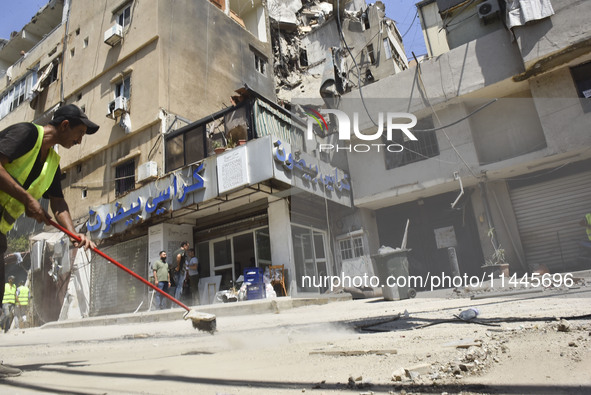 A view is showing a partially destroyed building, which is being targeted by the Israeli army, in Beirut, Lebanon, on July 31, 2024. The Isr...