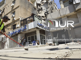 A view is showing a partially destroyed building, which is being targeted by the Israeli army, in Beirut, Lebanon, on July 31, 2024. The Isr...