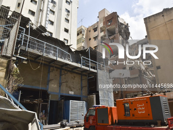 A view is showing a partially destroyed building, which is being targeted by the Israeli army, in Beirut, Lebanon, on July 31, 2024. The Isr...