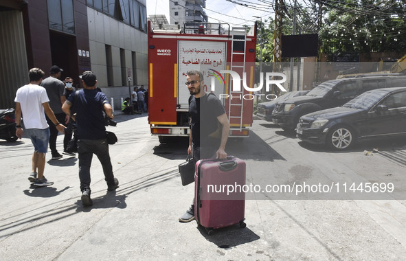 A view is showing a partially destroyed building, which is being targeted by the Israeli army, in Beirut, Lebanon, on July 31, 2024. The Isr...