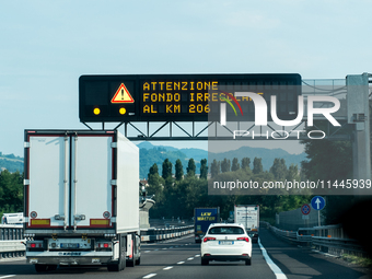 Mountain motorways between the nations of Italy, Austria, and Germany in July 2024 are showing illuminated signposts and car roads to Italy....