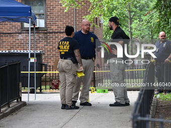 One person is being injured and one person is being killed in a shooting in Staten Island, New York, United States, on July 31, 2024. At app...