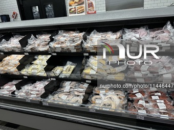 A deli meat counter is being seen at Walmart Supercenter in Teterboro, New Jersey, United States, on July 31, 2024. Seven million pounds of...