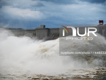 The Fengman Dam reservoir is opening the sluice to release floodwater in Jilin City, Jilin province, China, on July 31, 2024. (