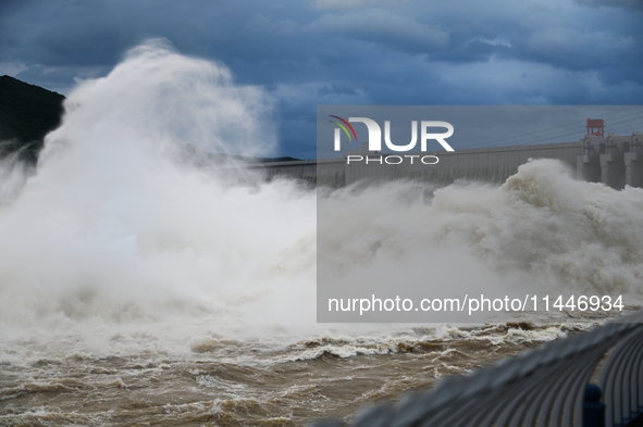 The Fengman Dam reservoir is opening the sluice to release floodwater in Jilin City, Jilin province, China, on July 31, 2024. 