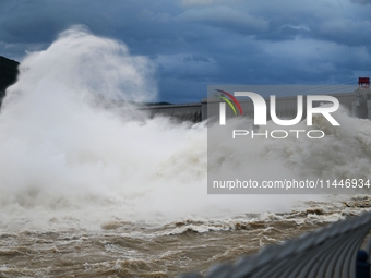 The Fengman Dam reservoir is opening the sluice to release floodwater in Jilin City, Jilin province, China, on July 31, 2024. (