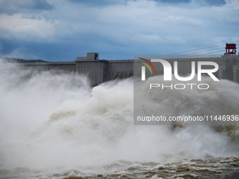 The Fengman Dam reservoir is opening the sluice to release floodwater in Jilin City, Jilin province, China, on July 31, 2024. (