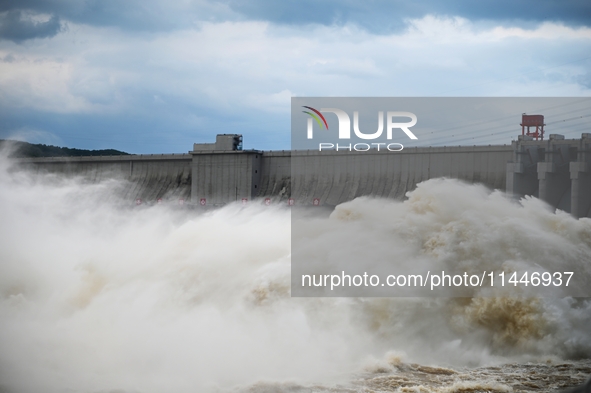 The Fengman Dam reservoir is opening the sluice to release floodwater in Jilin City, Jilin province, China, on July 31, 2024. 