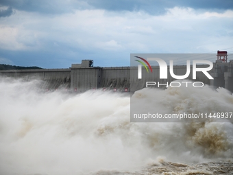 The Fengman Dam reservoir is opening the sluice to release floodwater in Jilin City, Jilin province, China, on July 31, 2024. (