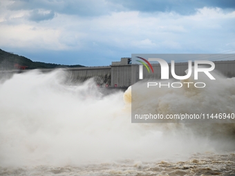 The Fengman Dam reservoir is opening the sluice to release floodwater in Jilin City, Jilin province, China, on July 31, 2024. (