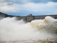 The Fengman Dam reservoir is opening the sluice to release floodwater in Jilin City, Jilin province, China, on July 31, 2024. (