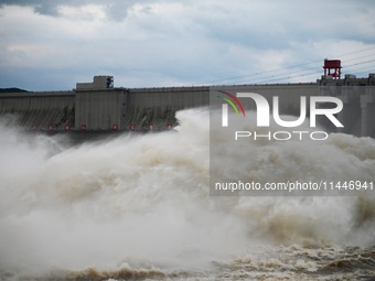 The Fengman Dam reservoir is opening the sluice to release floodwater in Jilin City, Jilin province, China, on July 31, 2024. (