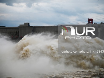 The Fengman Dam reservoir is opening the sluice to release floodwater in Jilin City, Jilin province, China, on July 31, 2024. (