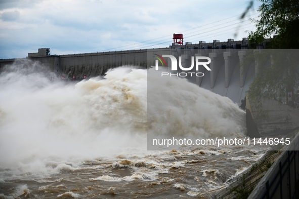 The Fengman Dam reservoir is opening the sluice to release floodwater in Jilin City, Jilin province, China, on July 31, 2024. 