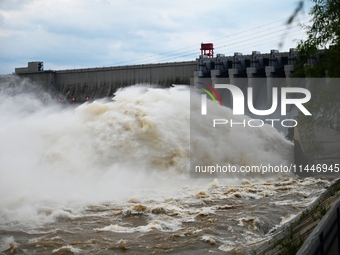 The Fengman Dam reservoir is opening the sluice to release floodwater in Jilin City, Jilin province, China, on July 31, 2024. (