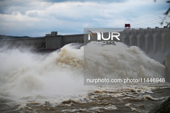 The Fengman Dam reservoir is opening the sluice to release floodwater in Jilin City, Jilin province, China, on July 31, 2024. 