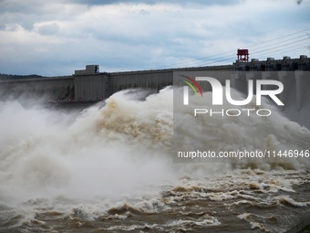 The Fengman Dam reservoir is opening the sluice to release floodwater in Jilin City, Jilin province, China, on July 31, 2024. (