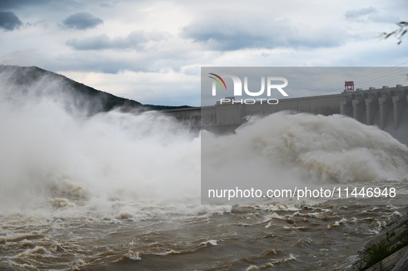 The Fengman Dam reservoir is opening the sluice to release floodwater in Jilin City, Jilin province, China, on July 31, 2024. 