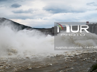 The Fengman Dam reservoir is opening the sluice to release floodwater in Jilin City, Jilin province, China, on July 31, 2024. (